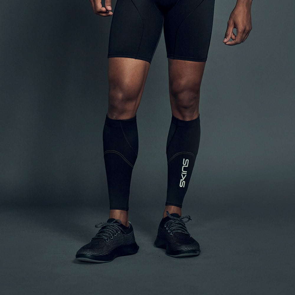 SKINS SERIES-3 UNISEX MX CALF SLEEVES BLACK ANGLE - SKINS